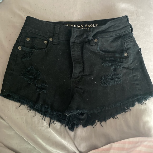 ripped black american eagle shorts